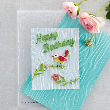 Spellbinders - 3D Embossing Folder - Knock On Wood. This has an intense wood grain designs. Texturize a surface of various card sizes from A2 to a Slimline. For detailed impression, lightly mist the cardstock on both sides with water before embossing. Available at Embellish Away located in Bowmanville Ontario Canada Card example by brand ambassador.