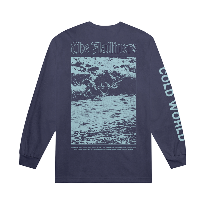 A navy The Flatliners Comfort Colors long-sleeve shirt with a large blue ocean wave graphic on the back, The Flatliners text above, and COLD WORLD boldly printed down the right sleeve.