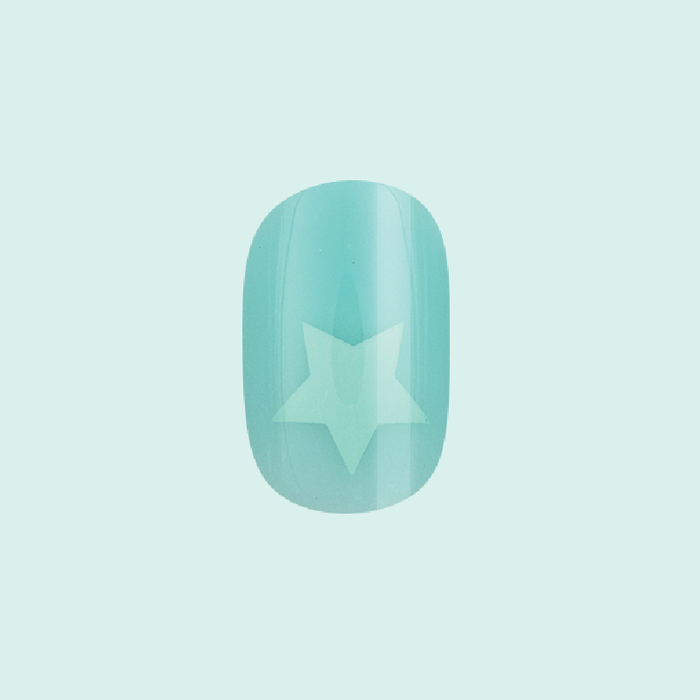 Spring Stars | Short | Squoval - Tab Press-On nail in mint pastel with subtle star detail for an easy at-home mani