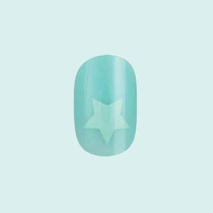 Spring Stars | Short | Squoval - Tab Press-On nail in mint pastel with subtle star detail for an easy at-home mani