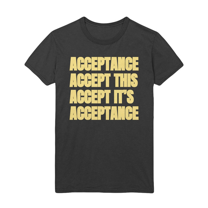 A black Acceptance t-shirt featuring bold yellow text: ACCEPTANCE ACCEPT THIS ACCEPT ITS ACCEPTANCE—ideal to wear with stacked shoes or black sneakers.