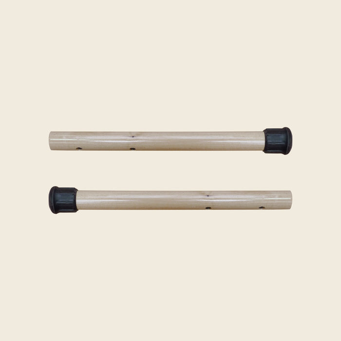Pair of wooden Gratz Pilates insert handles with black rubber end caps for mats.