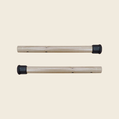 Pair of wooden Gratz Pilates insert handles with black rubber end caps for mats.