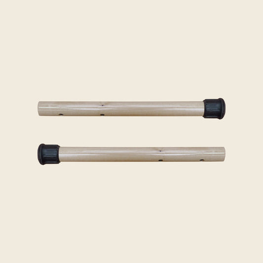 Pair of wooden Gratz Pilates insert handles with black rubber end caps for mats.