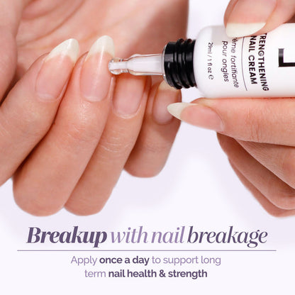 A person applies LONDONTOWN Strengthening Nail Cream daily to their fingernails with a dropper to help prevent nail breakage and improve long-term nail health and strength.