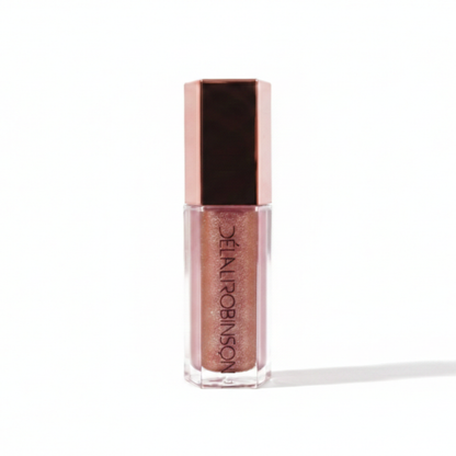 Lip gloss with rose gold cap and container on a white background