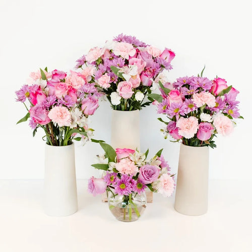 Sweet Harmony Pink Rose Centerpieces Hand - Image