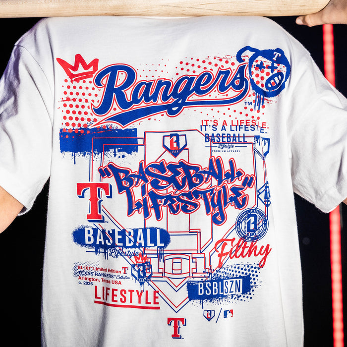Youth model wearing white youth graphic tee with "Texas Rangers Drip" design