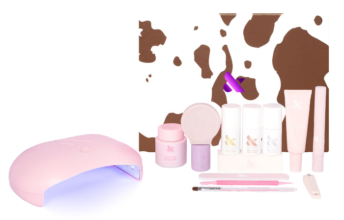 The Gel Mani System - 6 with pink UV lamp, gel polishes, nail care tools, and manicure accessories for at home use