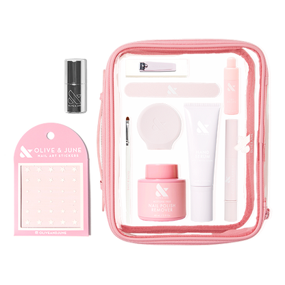 The Mani Weekender - 1 Polish kit with nail care essentials, quick dry polish, remover, stickers, and tools in a clear pink pouch
