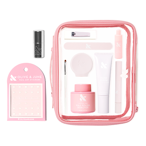The Mani Weekender - 1 Polish kit with nail care essentials, quick dry polish, remover, stickers, and tools in a clear pink pouch