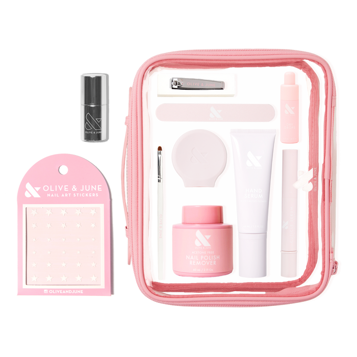 The Mani Weekender - 1 Polish kit with nail polish remover, hand serum, nail clipper, stickers, and clear pink pouch