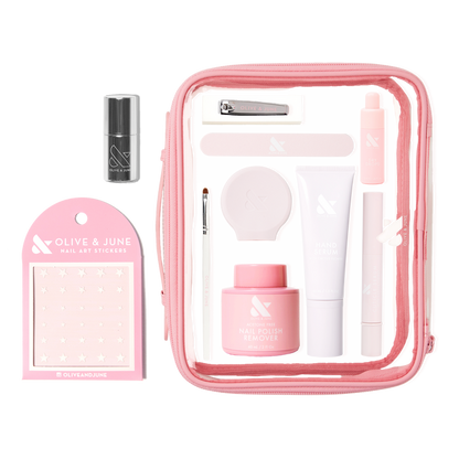 The Mani Weekender - 1 Polish kit with nail polish remover, hand serum, nail clipper, stickers, and clear pink pouch