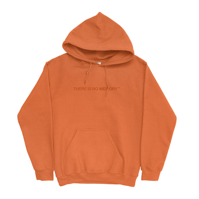 An orange Armor For Sleep hoodie with a front pocket and "THERE IS NO MEMORY" printed in bold capital letters across the chest.