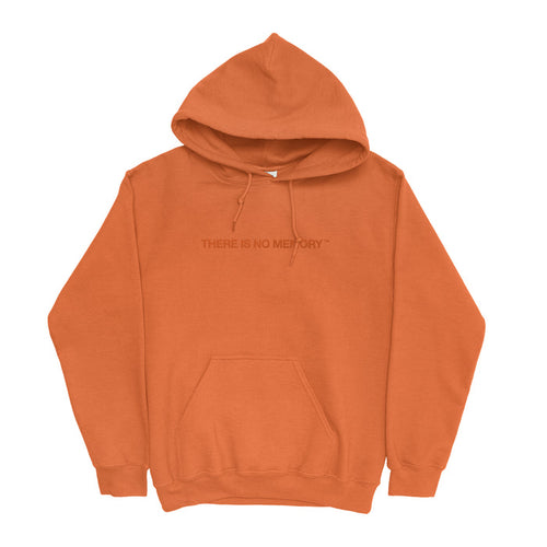 An orange Armor For Sleep hoodie with a front pocket and "THERE IS NO MEMORY" printed in bold capital letters across the chest.