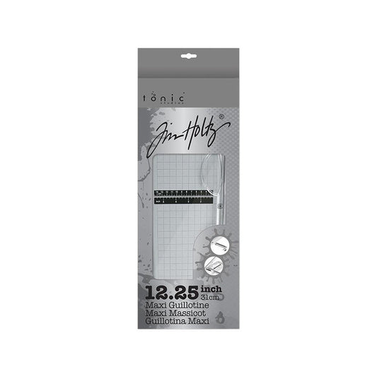 Tim Holtz - Maxi Guillotine - 12.25". Perfect for cutting paper and cardstock! This 8x19x3 inch package contains one 12.25 inch maxi guillotine. Measurements in both inches & metric. Paper guard protects fingers and prevents paper movement. Available at Embellish Away located in Bowmanville Ontario Canada.