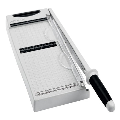 Tim Holtz - Maxi Guillotine - 12.25". Perfect for cutting paper and cardstock! This 8x19x3 inch package contains one 12.25 inch maxi guillotine. Measurements in both inches & metric. Paper guard protects fingers and prevents paper movement. Available at Embellish Away located in Bowmanville Ontario Canada.