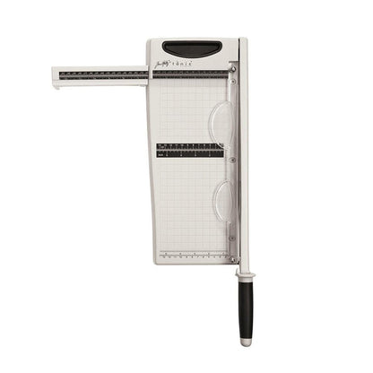 Tim Holtz - Maxi Guillotine - 12.25". Perfect for cutting paper and cardstock! This 8x19x3 inch package contains one 12.25 inch maxi guillotine. Measurements in both inches & metric. Paper guard protects fingers and prevents paper movement. Available at Embellish Away located in Bowmanville Ontario Canada.