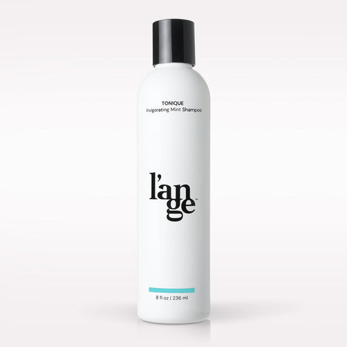 L’ange Tonique Invigorating Mint Shampoo on a blank background
