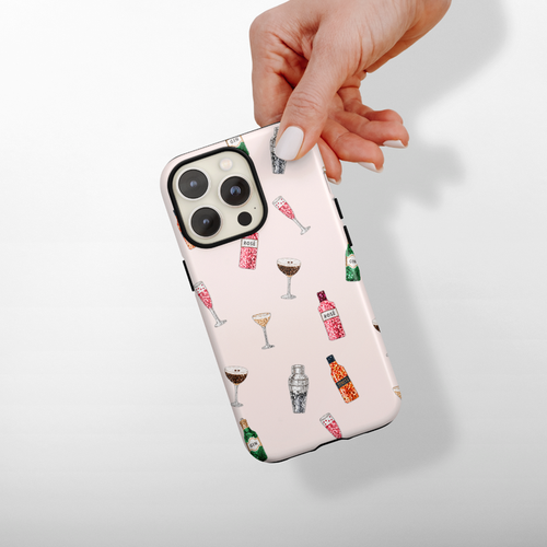Festive drinks on a pale pink background phone case.