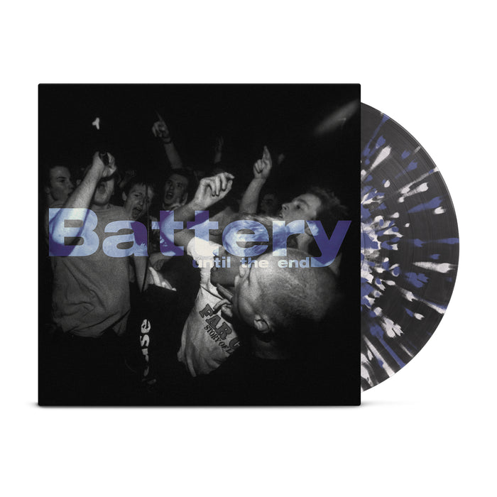 Purple, white, and black swirl vinyl peeks out of a black and white jacket with an image of a performer with a mic in front of multiple men partying. Purple letters in the center say, "Battery: until the end".
