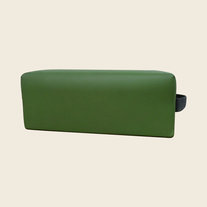 Green upholstered Pilates TV box with a black hook-and-loop carry strap on the side.