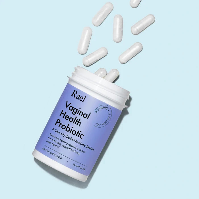 Vaginal Health Probiotics Supplement with capsules coming out of bottle.
