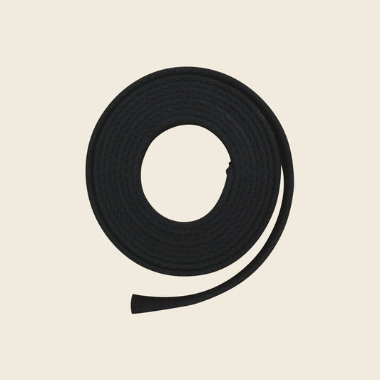 Black 90-inch webbing belly strap for Pilates Cadillac, coiled on a neutral background.