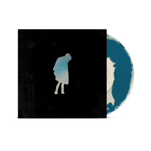 A blue and cream vinyl peeks out of a black jacket with a cream and blue figure that is leaning over.