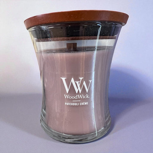 WoodWick Patchouli Crème hourglass candle with wooden lid