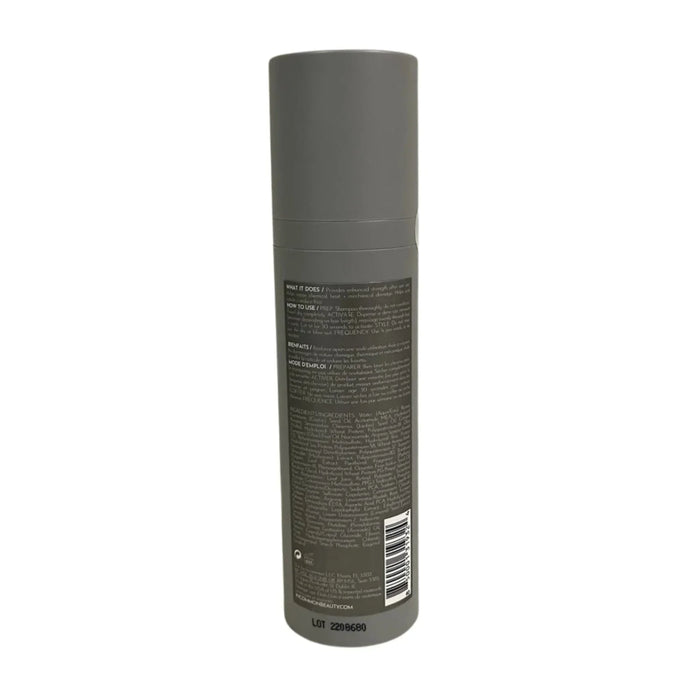 Gray leave-in hair repair treatment bottle with detailed product instructions and barcode